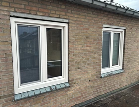 Complete bovenverdieping voorzien van nieuwe Kozijnen en voordeur Herkenbosch